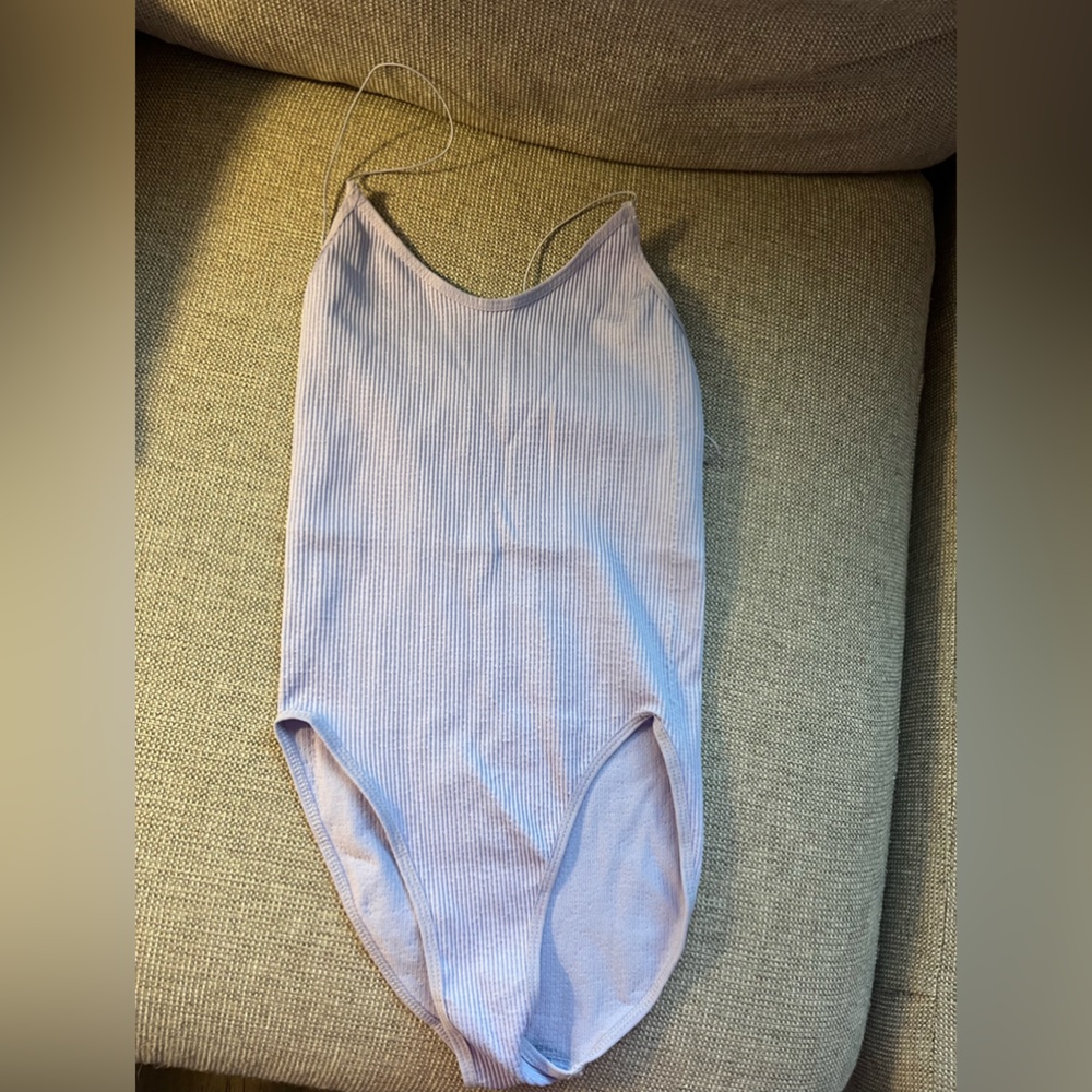 Seamless out from under body suit